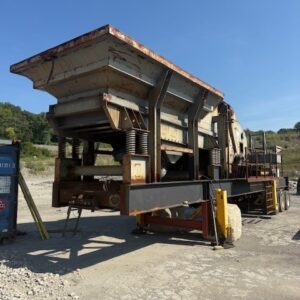 (2004) INERTIA 5066 IMPACT CRUSHER W/ VGF, UNDERCONVEYOR, 300HP MOTOR & NEW SOFT START ON 3-AXLE CHASSIS